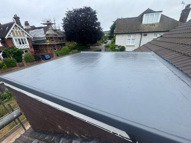 Southern Roofing Flat Roof on Brick Extention with Guttering